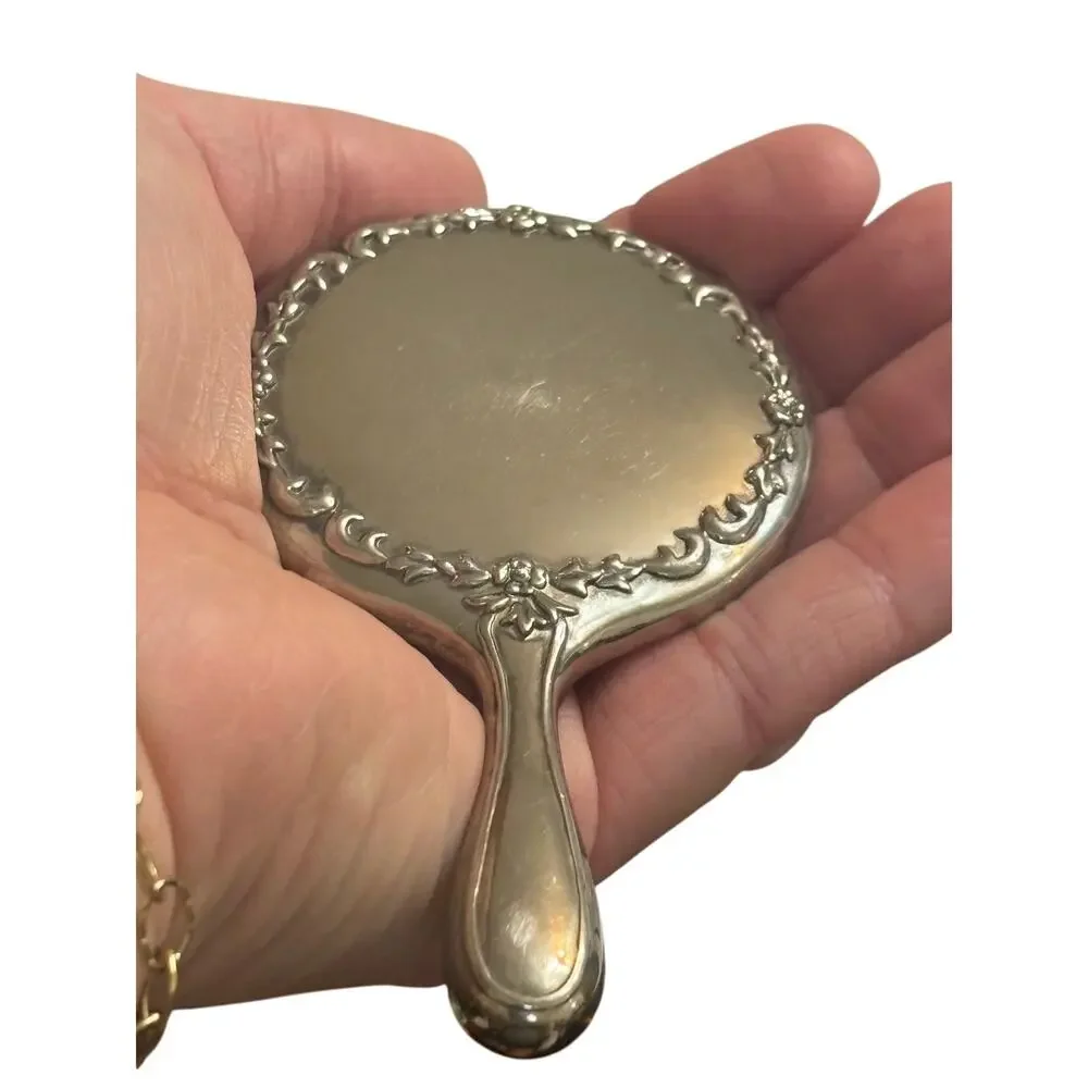 Sterling Antique Handheld Beveled Floral Design